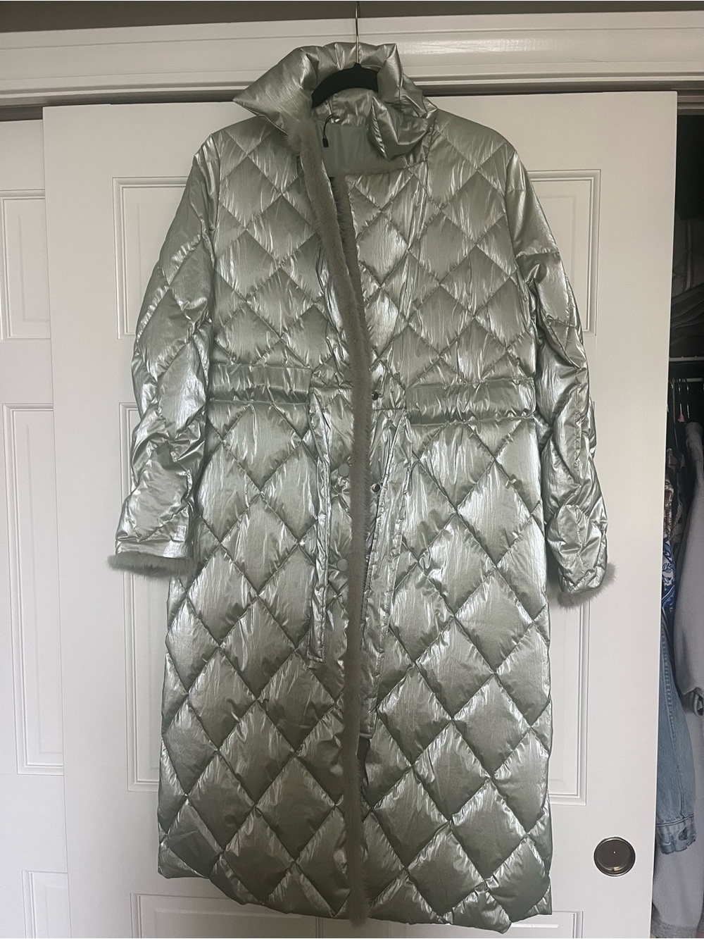 Quilted belted green goose feather down coat with mink fur trim